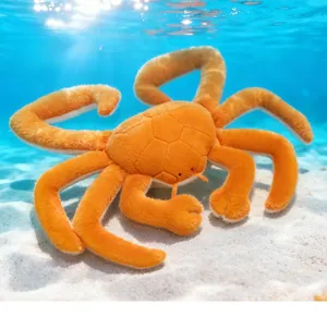 Macro detail of plush orange king crab toy with soft texture and realistic leg details