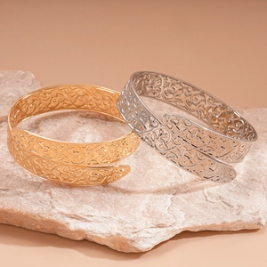 Vintage geometric hollowed vine pattern open cuff bracelet in gold and silver finish