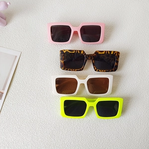 Fashionable retro square frame sunglasses for kids in various colors like pink and leopard