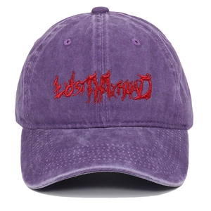 Detail of vintage washed purple cotton baseball cap with red gothic LOST MY HEAD embroidery