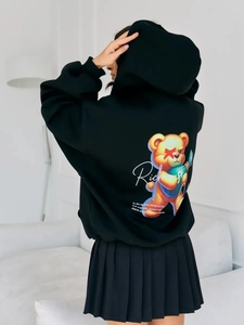 Detail of the oversized bear print on back of black fleece-lined zip hoodie