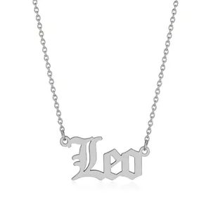 Macro shot of silver titanium steel Leo zodiac necklace with gothic letter pendant