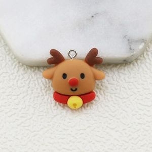 Detailed close-up of a resin reindeer Christmas pendant with a red collar and gold bell