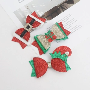 Three-piece Christmas hair clips set with glitter reindeer and Santa hat designs