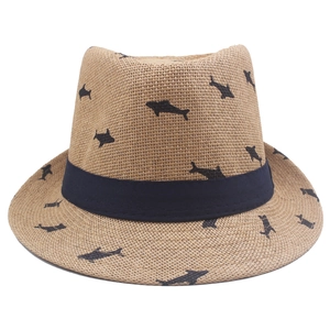 Light brown summer straw fedora for kids with dark blue ribbon and shark pattern