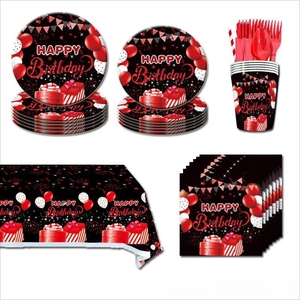 Detail of 13th birthday party tableware set with black and red balloon pattern