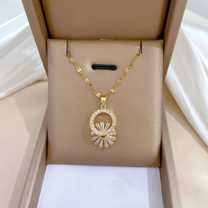 Luxurious gold flower jewelry set with sparkling crystals presented in a beige velvet box