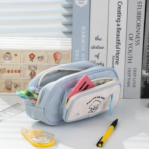 Detail of multi-layer high capacity cute dog stationery bag with zipper and handle