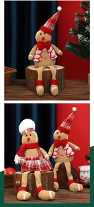 Detail of gingerbread plush toys in corduroy fabric with long legs for Xmas decor