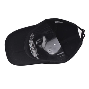 Detail showing internal lining of cotton baseball cap with Dolphin Hotel print