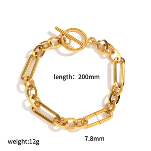 Macro detail of gold stainless steel chunky chain bracelet with OT toggle clasp and dimensions