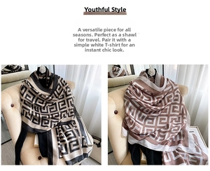Detail of elegant houndstooth and geometric pattern silk scarf with satin finish texture
