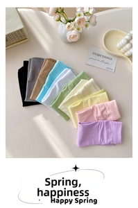 Flat lay of colorful thin velvet crew socks in macaron tones with spring floral decor