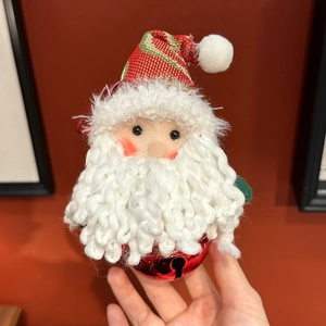 Knitted Santa Claus Christmas tree hanging ornament with a red metal bell and white beard