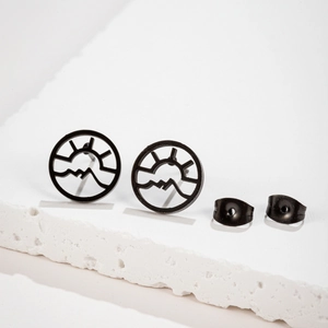 Minimalist geometric sun and mountain stainless steel stud earrings on stone