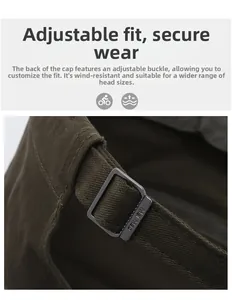 Detail of cotton flat top cap featuring adjustable metal buckle with engraved text