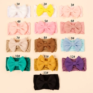 Detailed grid view showcasing 13 vibrant colors of high-elasticity nylon baby bow headbands