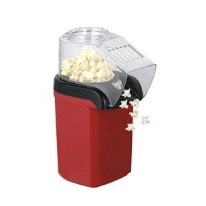 Electric red and white popcorn maker blowing fresh popcorn out against white background