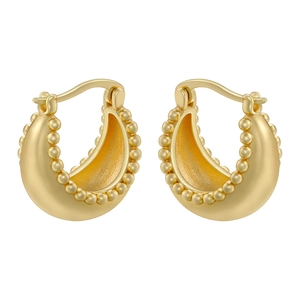 Detailed view of gold plated U-shaped earrings with decorative beaded edge design