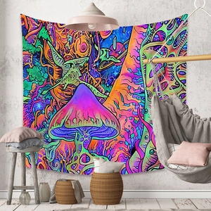 Detail of psychedelic mushroom tapestry with vibrant neon colors on a concrete wall
