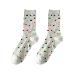 White mesh crew socks featuring colorful heart patterns in a flat lay perspective