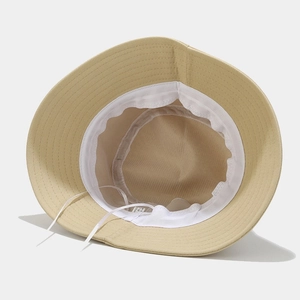 Detail of cotton fisherman hat interior with adjustable strap and white sweatband