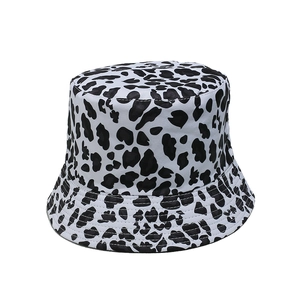 Detail shot of black and white leopard print bucket hat with durable canvas texture