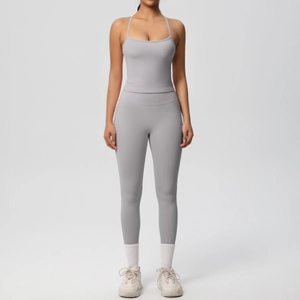 Front view of a light gray high-waisted yoga set featuring thin strap tank top and leggings