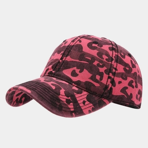 Close-up of pink leopard camo baseball cap showing stitching and fabric texture