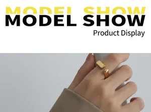 Detail of 18k gold plated stainless steel open ring with minimalist geometric design
