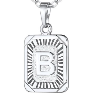 Polished silver letter B pendant necklace with sunburst texture on a classic cable chain