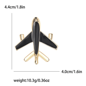 Gold and black enamel airplane brooch with dimensions 4.4x4.0cm and weight 10.3g