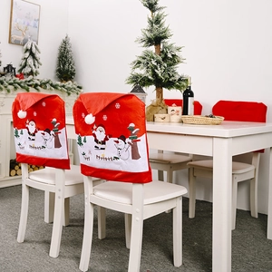Christmas chair covers with Santa Claus and Snowman prints on white chairs for holiday decor
