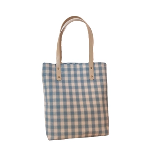Vintage gingham canvas tote bag with brown faux leather handles and rivet details