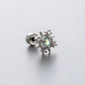 Single silver sunburst stud earring with rainbow moonstone and sparkling accents