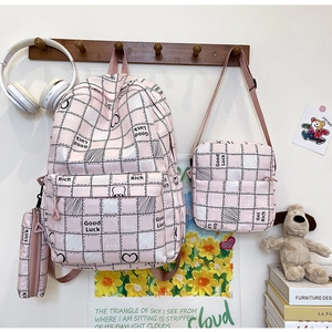 Pink plaid 3-piece school bag set including backpack, crossbody bag, and pencil case