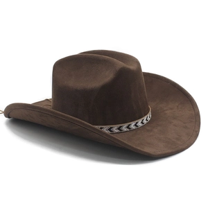 Close-up of a wide brim faux suede fedora with black and white geometric pattern band