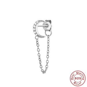 Detail of S925 sterling silver moon earring with tassel chain and embedded cubic zirconia
