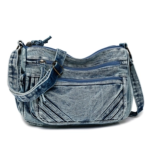 Denim multi-pocket crossbody bag in washed blue with vintage street style design