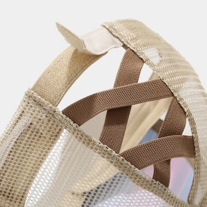 Close-up of khaki mesh ponytail baseball cap with criss-cross elastic bands and velcro strap