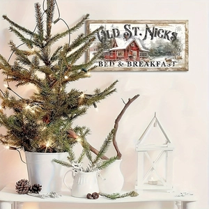 Detail view of retro Christmas wooden door sign with Old St. Nick's Bed & Breakfast text