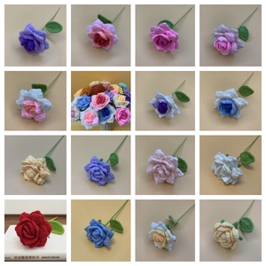 Macro display of diverse hand-knitted crochet roses in multiple colors for home decor