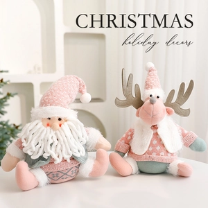 Pink and white Christmas plush gnome and reindeer ornaments for holiday tabletop decor