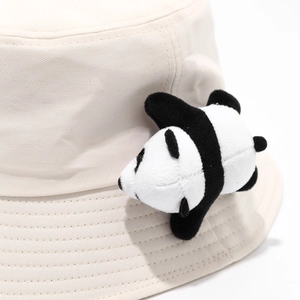 Beige canvas bucket hat with a cute 3D panda plush doll and stitched brim detail
