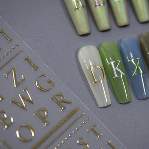 3D metallic alphabet nail art stickers with gold and silver embossed letter designs
