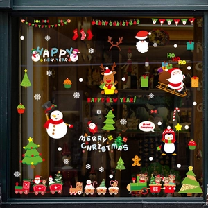 Christmas and New Year window stickers with Santa, snowman and festive tree decorations