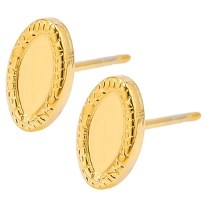 Detail view of golden oval earrings with textured wavy edges and polished mirror surface