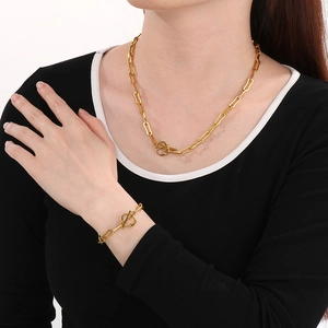 Minimalist gold paperclip chain necklace and bracelet set with OT toggle clasp