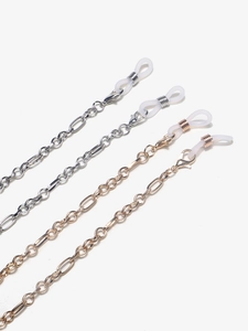 Detail of metal eyeglass chains in gold and silver finish with lobster clasps and silicone loops