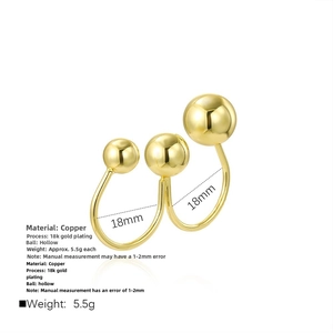 Detailed view of 18k gold plated hollow triple sphere geometric ring with 18mm size specs